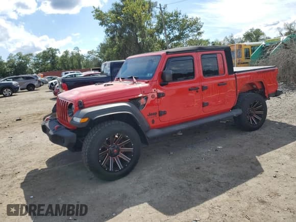 ✅ 2020 Jeep Gladiator Sport S • VIN: 1C6JJTAG0LL133527 • Лот: 70139015. Опубликован ранее на Copart с пробегом 68 964 миль. Бесплатный доступ к архиву аукционных продаж из США и подробный отчёт об истории автомобиля на DreamBid. Изображение 1.