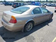 ✅ 2000 Chrysler 300M M • VIN: 2C3HE66G5YH350523 • Lot: 42795060. Wystawiony na IAAI z przebiegiem 124 061 mil. Bezpłatny archiwum sprzedaży aukcyjnych z USA i szczegółowy raport historii pojazdu na DreamBid. Zdjęcie 4.