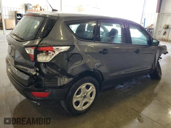 ✅ 2018 Ford Escape S • VIN: 1FMCU0F7XJUB25504 • Lot: 82400425. Listed on Copart with 133,945 mi. Free auction sales archive from the USA and detailed vehicle history report at DreamBid. Image 3.