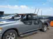 2021 Ram 1500 Tradesman z VIN 1C6RR6FG8MS525121, wystawiony jako IAAI lot #42886475 z przebiegiem Nie podano mil oraz . Historia ofert i sprzedaży dostępna na DreamBid. Obrazek 6.