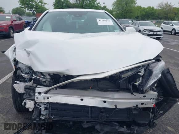 2021 Toyota Camry Hybrid LE with VIN 4T1C31AK8MU565617, listed as a IAAI auction lot 42260273 with 40,860 mi miles and . Bid and sale history available at DreamBid. Image 19.