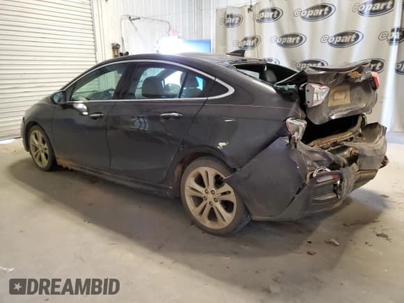 ✅ 2017 Chevrolet Cruze Premier • VIN: 1G1BF5SM9H7118449 • Lot: 68184502. Listed on Copart with 96,367 mi. Free auction sales archive from the USA and detailed vehicle history report at DreamBid. Image 2.