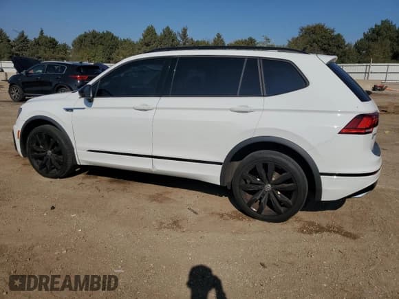 ✅ 2021 Volkswagen Tiguan SE • VIN: 3VV2B7AX3MM098596 • Lot: 87100975. Listed on Copart with 52,291 mi. Free auction sales archive from the USA and detailed vehicle history report at DreamBid. Image 2.