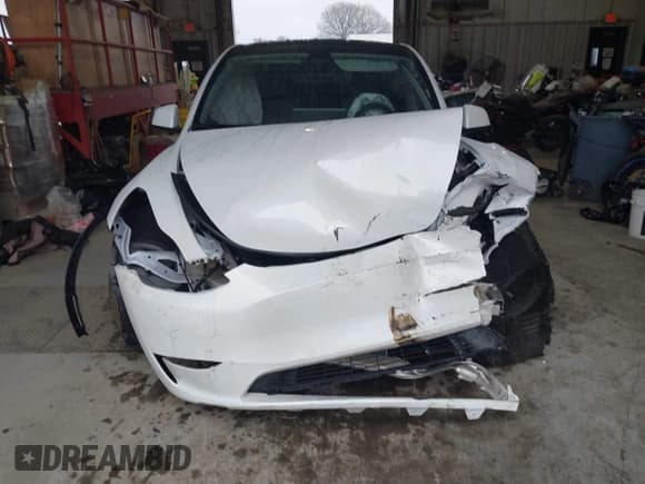 ✅ 2023 Tesla Model Y Long Range • VIN: 7SAYGAEEXPF789037 • Lot: 41551605. Listed on IAAI with 8,630 mi. Free auction sales archive from the USA and detailed vehicle history report at DreamBid. Image 12.