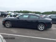 ✅ 2023 Dodge Charger SXT • VIN: 2C3CDXBG5PH579520 • Lot: 43245472. Listed on IAAI with 59,873 mi. Free auction sales archive from the USA and detailed vehicle history report at DreamBid. Image 14.