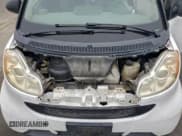 ✅ 2009 Smart fortwo Pure • VIN: WMEEJ31X39K322229 • Lot: 95828695. Wystawiony na Copart z przebiegiem 88 447 mil. Bezpłatny archiwum sprzedaży aukcyjnych z USA i szczegółowy raport historii pojazdu na DreamBid. Zdjęcie 11.