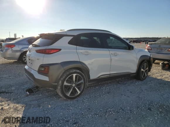 ✅ 2018 Hyundai Kona Limited • VIN: KM8K33A50JU105431 • Лот: 41850444. Опубликован ранее на Copart с пробегом 94 225 миль. Бесплатный доступ к архиву аукционных продаж из США и подробный отчёт об истории автомобиля на DreamBid. Изображение 3.
