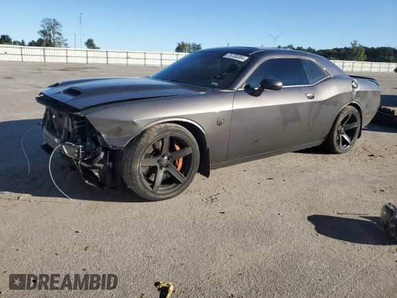 2021 Dodge Challenger SRT Hellcat с VIN 2C3CDZC9XMH670144, выставлен на аукционе Copart как лот 75730364 с пробегом 21 469 миль миль и Списание • Salvage title. История ставок и продаж доступна на DreamBid. Изображение 1.