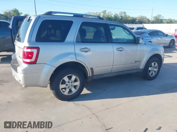 ✅ 2009 Ford Escape Hybrid • VIN: 1FMCU49369KA52087 • Lot: 43491225. Listed on IAAI with 208,540 mi. Free auction sales archive from the USA and detailed vehicle history report at DreamBid. Image 4.