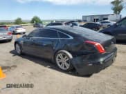 ✅ 2014 Jaguar XJ Portfolio • VIN: SAJWA2GZ4E8V59150 • Лот: 60863785. Опубликован ранее на Copart с пробегом 106 279 миль. Бесплатный доступ к архиву аукционных продаж из США и подробный отчёт об истории автомобиля на DreamBid. Изображение 2.