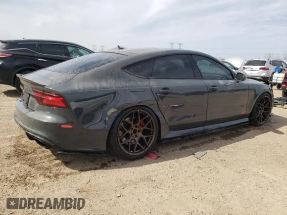 ✅ 2016 Audi RS 7 Prestige • VIN: WUAW2AFC2GN901494 • Lot: 52958345. Wystawiony na Copart z przebiegiem 99 718 mil. Bezpłatny archiwum sprzedaży aukcyjnych z USA i szczegółowy raport historii pojazdu na DreamBid. Zdjęcie 3.