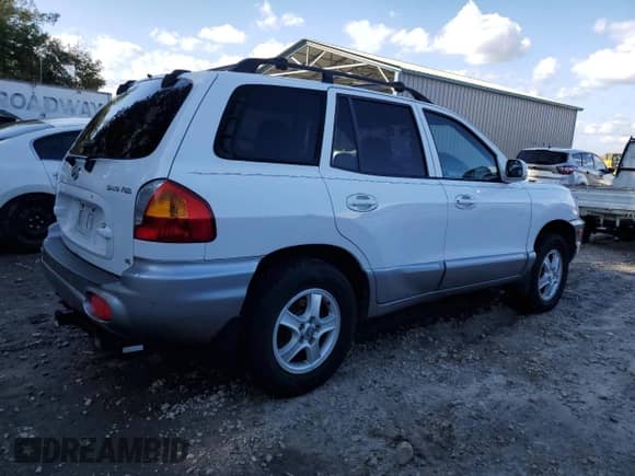 2001 Hyundai Santa Fe GLS z VIN KM8SC83D91U084712, wystawiony jako Copart lot #87107674 z przebiegiem 111 465 mil mil oraz Czysty tytuł • Clean title. Historia ofert i sprzedaży dostępna na DreamBid. Obrazek 3.