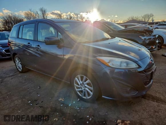 ✅ 2012 Mazda 5 Sport • VIN: JM1CW2BL9C0138039 • Lot: 94747015. Wystawiony na Copart z przebiegiem 168 251 mil. Bezpłatny archiwum sprzedaży aukcyjnych z USA i szczegółowy raport historii pojazdu na DreamBid. Zdjęcie 4.