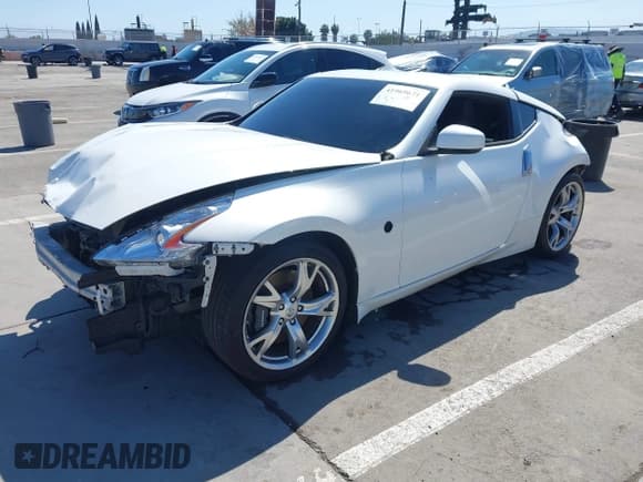 ✅ 2009 Nissan 370Z Touring • VIN: JN1AZ44E99M411252 • Lot: 41969671. Listed on IAAI with 91,873 mi. Free auction sales archive from the USA and detailed vehicle history report at DreamBid. Image 2.