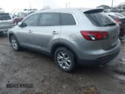 ✅ 2015 Mazda CX-9 Sport • VIN: JM3TB3BA8F0452471 • Lot: 43788093. Wystawiony na IAAI z przebiegiem 155 437 mil. Bezpłatny archiwum sprzedaży aukcyjnych z USA i szczegółowy raport historii pojazdu na DreamBid. Zdjęcie 3.