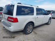 ✅ 2011 Lincoln Navigator • VIN: 5LMJJ3H56BEJ01271 • Lot: 42678027. Listed on IAAI with 260,751 mi. Free auction sales archive from the USA and detailed vehicle history report at DreamBid. Image 4.