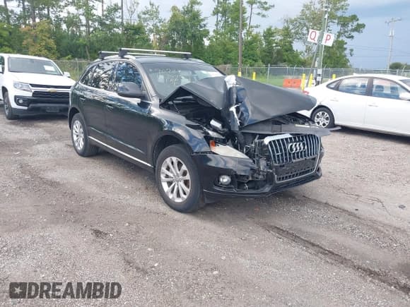 ✅ 2014 Audi Q5 Premium • VIN: WA1CFAFP1EA097100 • Lot: 43004248. Listed on IAAI with 154,372 mi. Free auction sales archive from the USA and detailed vehicle history report at DreamBid. Image 1.