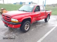 ✅ 2000 Dodge Dakota Sport • VIN: 1B7GG2ANXYS621732 • Lot: 41930673. Wystawiony na IAAI z przebiegiem 145 653 mil. Bezpłatny archiwum sprzedaży aukcyjnych z USA i szczegółowy raport historii pojazdu na DreamBid. Zdjęcie 2.