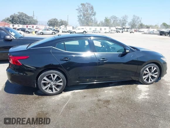 ✅ 2016 Nissan Maxima SR • VIN: 1N4AA6APXGC380558 • Лот: 42966389. Опубликован ранее на IAAI с пробегом 137 310 миль. Бесплатный доступ к архиву аукционных продаж из США и подробный отчёт об истории автомобиля на DreamBid. Изображение 14.