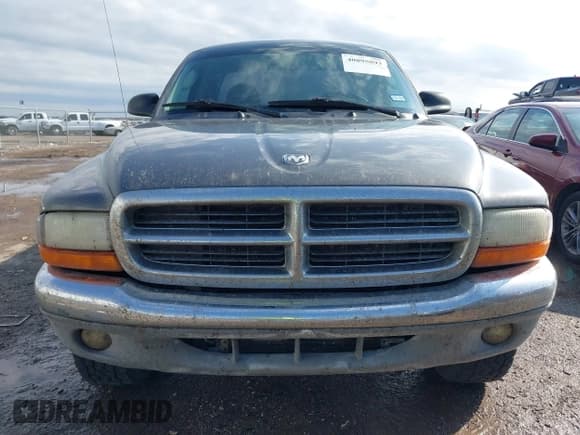 ✅ 2004 Dodge Dakota SLT • VIN: 1D7HG42N44S618405 • Lot: 40895893. Wystawiony na IAAI z przebiegiem 172 324 mil. Bezpłatny archiwum sprzedaży aukcyjnych z USA i szczegółowy raport historii pojazdu na DreamBid. Zdjęcie 12.