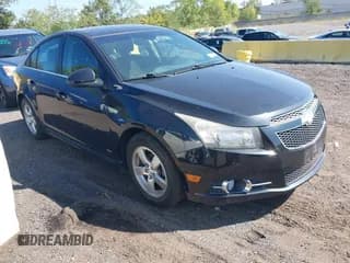 ✅ 2013 Chevrolet Cruze 1LT • VIN: 1G1PC5SB5D7251376 • Lot: 43268097. Listed on IAAI with 113,015 mi. Free auction sales archive from the USA and detailed vehicle history report at DreamBid. Image 1.