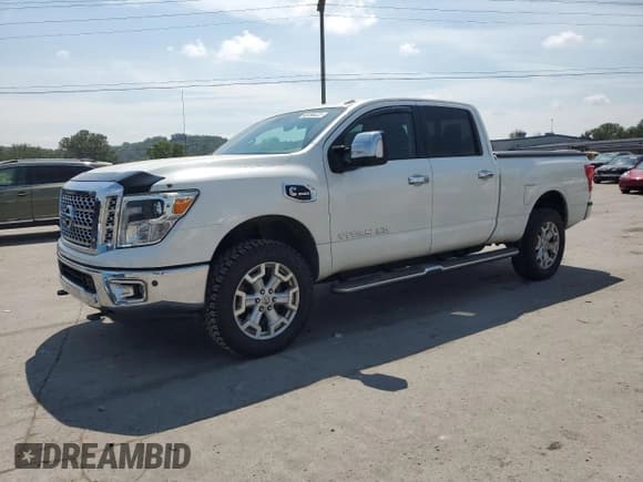 ✅ 2016 Nissan Titan Platinum Reserve • VIN: 1N6BA1F28GN509347 • Lot: 69199025. Listed on Copart with 131,330 mi. Free auction sales archive from the USA and detailed vehicle history report at DreamBid. Image 1.
