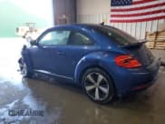 ✅ 2014 Volkswagen Beetle Turbo R-Line • VIN: 3VWVT7AT2EM629047 • Лот: 46820915. Опубликован ранее на Copart с пробегом 96 290 миль. Бесплатный доступ к архиву аукционных продаж из США и подробный отчёт об истории автомобиля на DreamBid. Изображение 2.