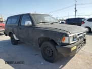 ✅ 1990 Toyota Pickup • VIN: JT4RN81A8L0045321 • Lot: 61399095. Listed on Copart with 238,214 mi. Free auction sales archive from the USA and detailed vehicle history report at DreamBid. Image 4.
