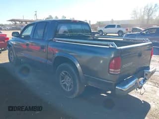 ✅ 2003 Dodge Dakota SLT • VIN: 1D7HL48X03S174569 • Lot: 41159169. Wystawiony na IAAI z przebiegiem 156 551 mil. Bezpłatny archiwum sprzedaży aukcyjnych z USA i szczegółowy raport historii pojazdu na DreamBid. Zdjęcie 3.