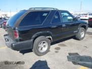 ✅ 2003 Chevrolet Blazer Xtreme • VIN: 1GNCS18XX3K108303 • Lot: 43593593. Wystawiony na IAAI z przebiegiem 135 383 mil. Bezpłatny archiwum sprzedaży aukcyjnych z USA i szczegółowy raport historii pojazdu na DreamBid. Zdjęcie 4.