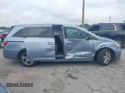 ✅ 2012 Honda Odyssey Touring • VIN: 5FNRL5H90CB126640 • Lot: 43287795. Listed on IAAI with 185,534 mi. Free auction sales archive from the USA and detailed vehicle history report at DreamBid. Image 14.