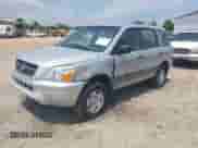 2004 Honda Pilot LX with VIN 2HKYF18184H562032, listed as a IAAI auction lot 42400804 with Not provided miles and . Bid and sale history available at DreamBid. Image 2.