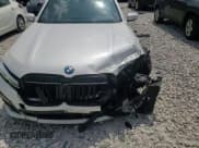 ✅ 2020 BMW 7 Series 740i xDrive • VIN: WBA7T4C0XLCD70397 • Лот: 66119165. Опубликован ранее на Copart с пробегом 50 215 миль. Бесплатный доступ к архиву аукционных продаж из США и подробный отчёт об истории автомобиля на DreamBid. Изображение 13.