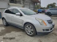 ✅ 2012 Cadillac SRX Performance Collection • VIN: 3GYFNBE36CS511407 • Lot: 95206575. Listed on Copart with 156,870 mi. Free auction sales archive from the USA and detailed vehicle history report at DreamBid. Image 4.