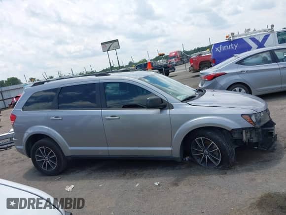 2018 Dodge Journey SE с VIN 3C4PDCAB9JT444843, выставлен на аукционе IAAI как лот 42473807 с пробегом 146 996 миль миль и . История ставок и продаж доступна на DreamBid. Изображение 14.