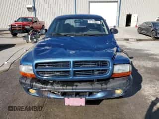2002 Dodge Dakota Sport z VIN 1B7HL38N72S589857, wystawiony jako Copart lot #77138924 z przebiegiem 197 117 mil mil oraz Szkoda całkowita • Salvage title. Historia ofert i sprzedaży dostępna na DreamBid. Obrazek 5.