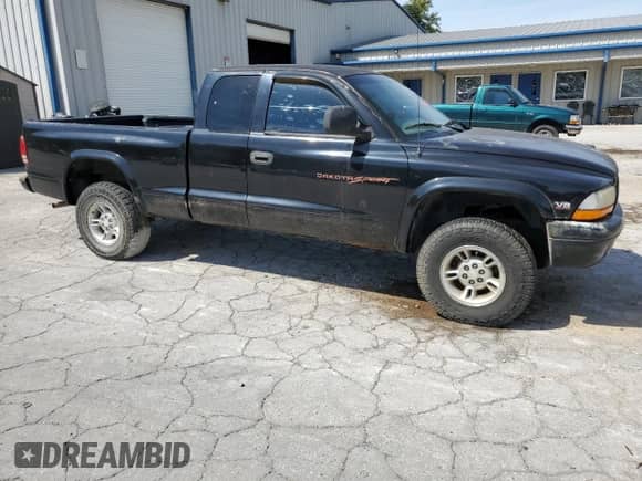 1998 Dodge Dakota SLT with VIN 1B7GG22Y6WS744109, listed as a Copart auction lot 71273154 with 155,566 mi miles and Salvage title. Bid and sale history available at DreamBid. Image 4.