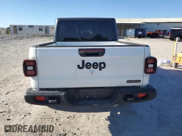 ✅ 2021 Jeep Gladiator Freedom • VIN: 1C6HJTAG8ML562950 • Lot: 91608665. Listed on Copart with 57,756 mi. Free auction sales archive from the USA and detailed vehicle history report at DreamBid. Image 6.