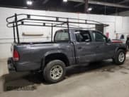 ✅ 2003 Dodge Dakota Sport • VIN: 1D7HL38X53S236624 • Lot: 80652444. Wystawiony na Copart z przebiegiem 136 363 mil. Bezpłatny archiwum sprzedaży aukcyjnych z USA i szczegółowy raport historii pojazdu na DreamBid. Zdjęcie 3.