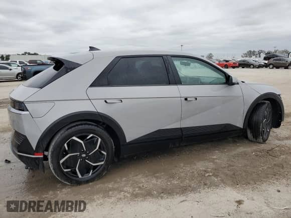 2022 Hyundai Ioniq 5 SE z VIN KM8KM4AE6NU073142, wystawiony jako Copart lot #74694473 z przebiegiem 28 623 mil mil oraz . Historia ofert i sprzedaży dostępna na DreamBid. Obrazek 3.