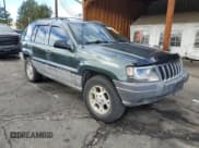 ✅ 2001 Jeep Grand Cherokee Laredo • VIN: 1J4GW48S61C596039 • Lot: 85932785. Listed on Copart with 185,240 mi. Free auction sales archive from the USA and detailed vehicle history report at DreamBid. Image 4.