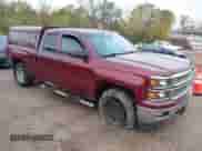 2014 Chevrolet Silverado 1500 LT z VIN 1GCRCREH1EZ403294, wystawiony jako IAAI lot #43519990 z przebiegiem 229 946 mil mil oraz . Historia ofert i sprzedaży dostępna na DreamBid. Obrazek 1.