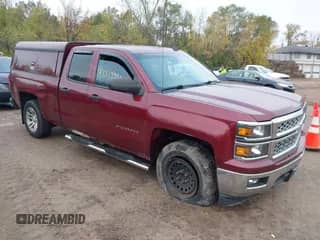 2014 Chevrolet Silverado 1500 LT z VIN 1GCRCREH1EZ403294, wystawiony jako IAAI lot #43519990 z przebiegiem 229 946 mil mil oraz . Historia ofert i sprzedaży dostępna na DreamBid. Obrazek 1.