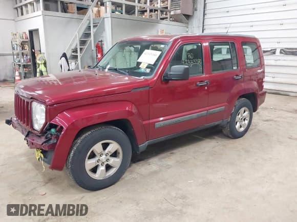 ✅ 2011 Jeep Liberty Sport Jet • VIN: 1J4PN2GK5BW531790 • Lot: 42333380. Listed on IAAI with 179,835 mi. Free auction sales archive from the USA and detailed vehicle history report at DreamBid. Image 2.