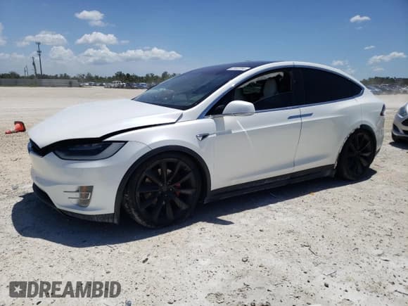 ✅ 2017 Tesla Model X P90D • VIN: 5YJXCAE45HF075748 • Lot: 63442394. Listed on Copart with 126,746 mi. Free auction sales archive from the USA and detailed vehicle history report at DreamBid. Image 1.