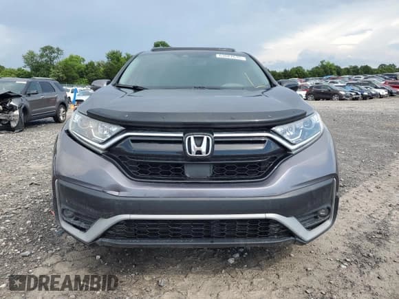 ✅ 2020 Honda CR-V EX-L • VIN: 7FARW1H88LE016544 • Lot: 63087635. Listed on Copart with 128,498 mi. Free auction sales archive from the USA and detailed vehicle history report at DreamBid. Image 5.