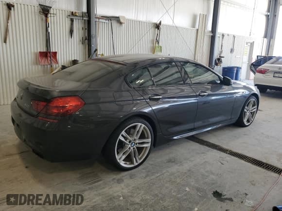 ✅ 2015 BMW 6 Series 650i xDrive • VIN: WBA6B4C53FD761025 • Лот: 81804665. Опубликован ранее на Copart с пробегом 89 423 миль. Бесплатный доступ к архиву аукционных продаж из США и подробный отчёт об истории автомобиля на DreamBid. Изображение 3.