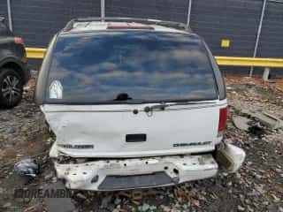 2001 Chevrolet Blazer LT z VIN 1GNCS13W612198738, wystawiony jako Copart lot #80969694 z przebiegiem 299 569 mil mil oraz Szkoda całkowita • Salvage title. Historia ofert i sprzedaży dostępna na DreamBid. Obrazek 6.