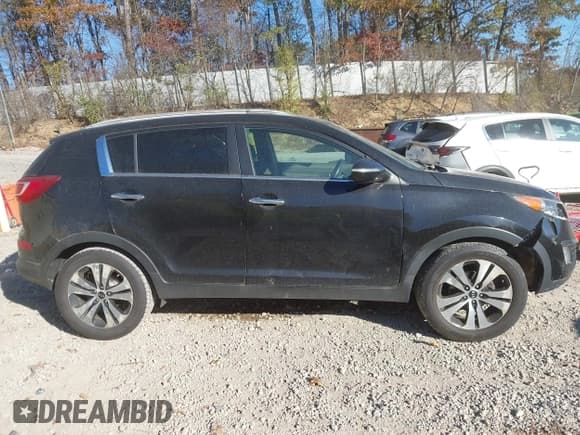 ✅ 2011 Kia Sportage EX • VIN: KNDPC3A2XB7049319 • Лот: 43489186. Опубликован ранее на IAAI с пробегом 191 212 миль. Бесплатный доступ к архиву аукционных продаж из США и подробный отчёт об истории автомобиля на DreamBid. Изображение 13.