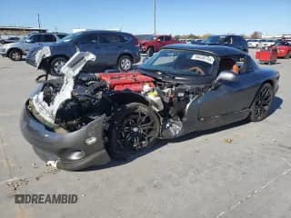 ✅ 2002 Dodge Viper RT/10 • VIN: 1B3ER65E02V102232 • Lot: 84650754. Listed on Copart with 16,100 mi. Free auction sales archive from the USA and detailed vehicle history report at DreamBid. Image 1.